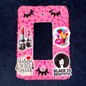 This is my pink make up light switch cover. This is beautiful to go in your home